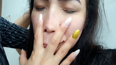 Powerful Hands: A Facial Massage With Polished Nails